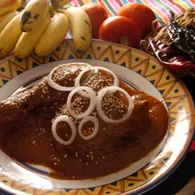 Mole poblano on a talavera plate